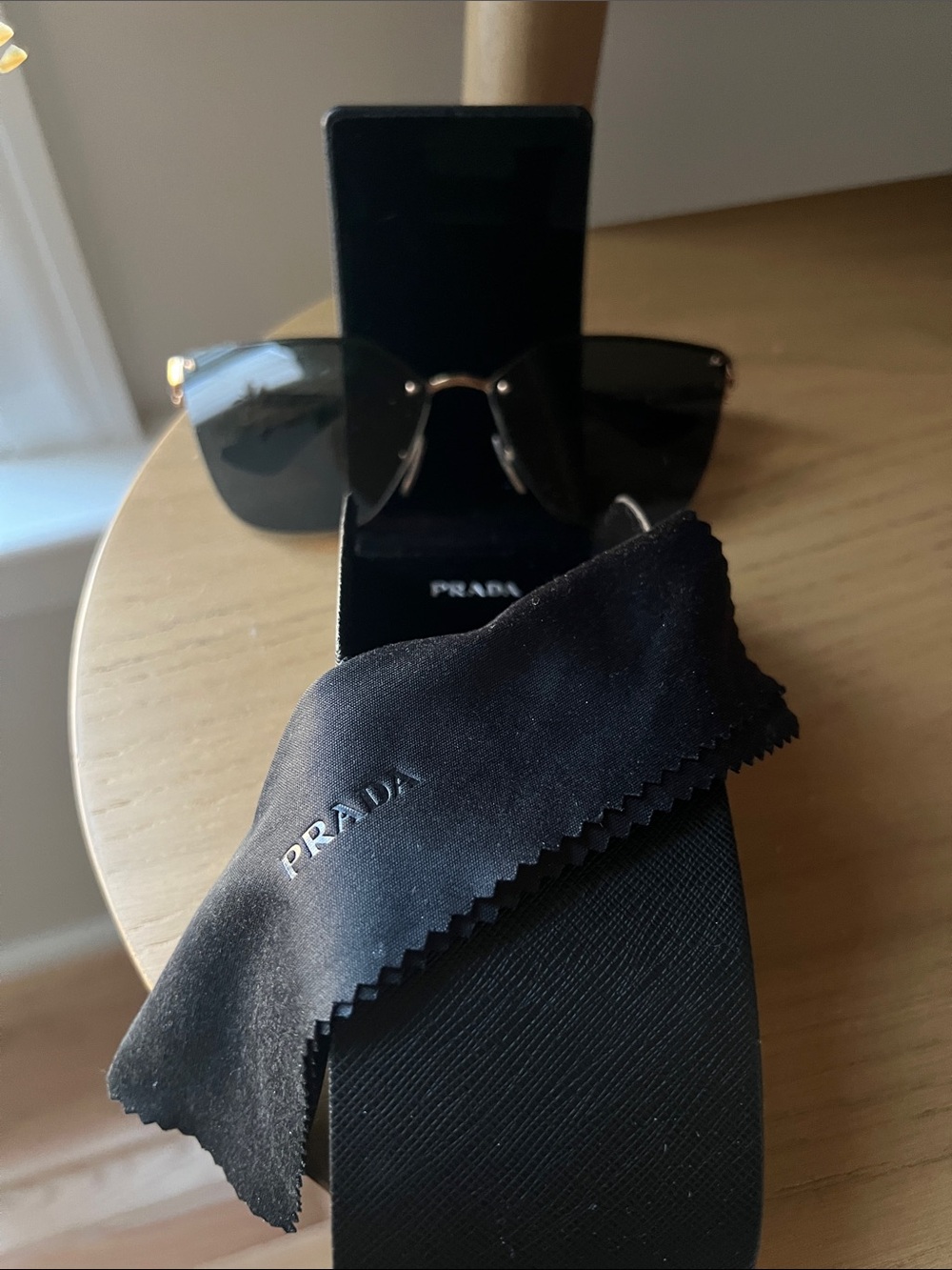 Prada Black Sunglasses with Gold Accents
